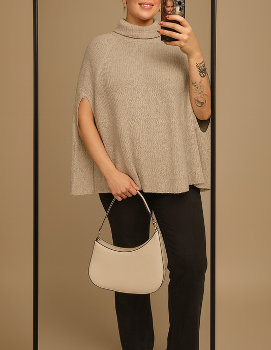 Poncho ample en maille à col roulé solide